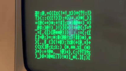 A cursor moving around a 10 x 25 grid of random characters.