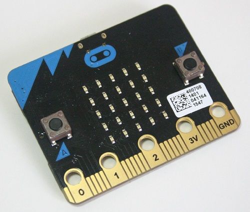 It's no supercomputer A picture of the Micro:Bit and its packaging. It has a 5x5 array of LEDs in the middle, with a button either side.